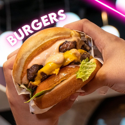 2 Hamburguesas + 6 Alitas + Papas Curly + 1 Cubetazo por $25 en Beauty and The Butcher